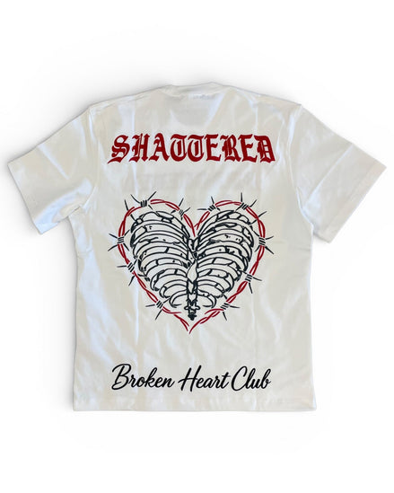 T-shirt with 'Shattered' and 'Broken Heart Club' design on a white background