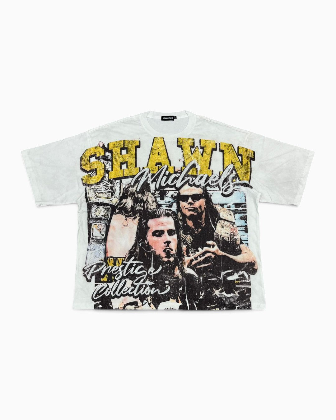 A white graphic t-shirt featuring a distressed print of Shawn Mendes with yellow and black text reading 'SHAWN' and 'Pretend Collection'.