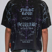 Person wearing a black t-shirt with white text and graphics on a plain background