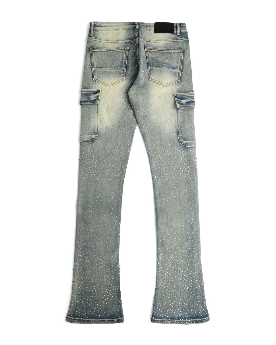 Distressed blue jeans on a white background