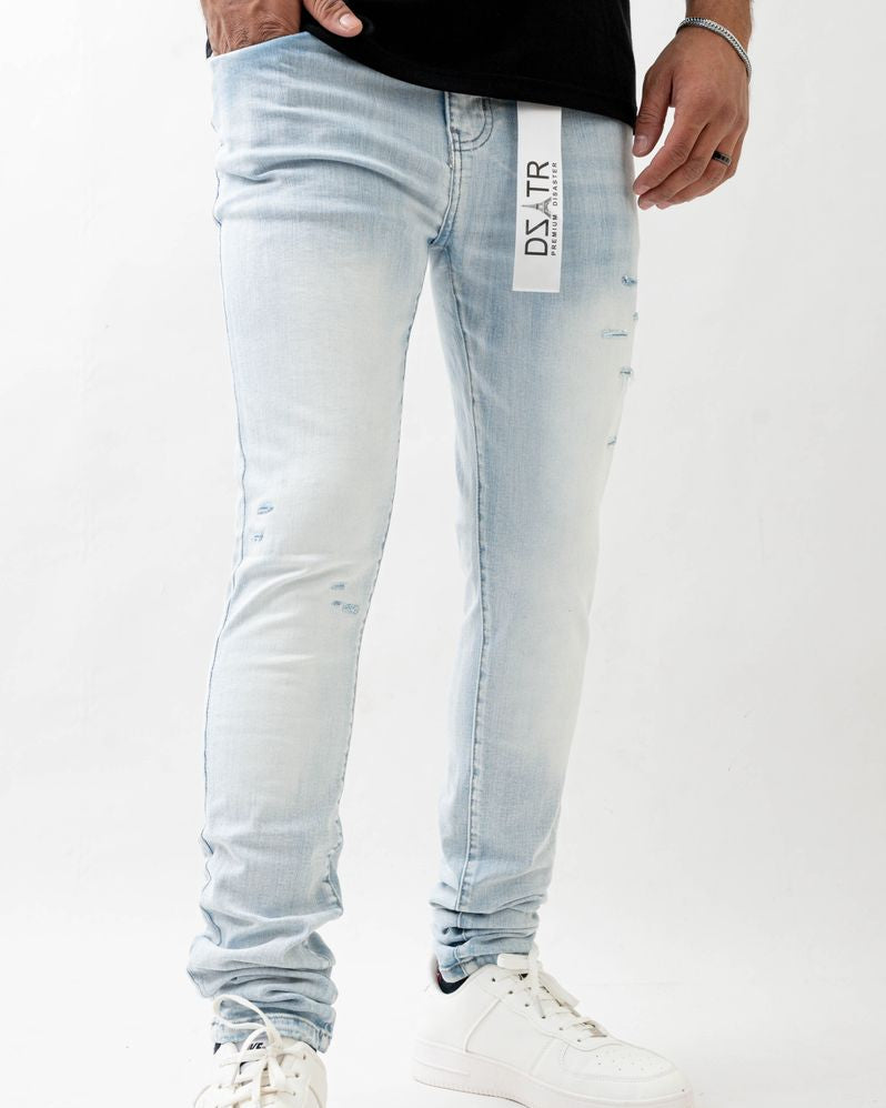 Light blue jeans with a brand label on a white background