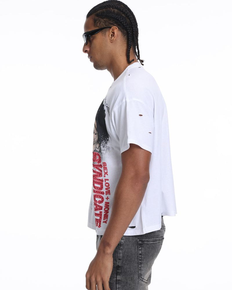 Person wearing a white t-shirt with red text on a white background