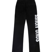 Black wide-leg sweatpants with a vertical white 'SOHO HOUSE' logo printed down the left leg, shown against a plain white background.