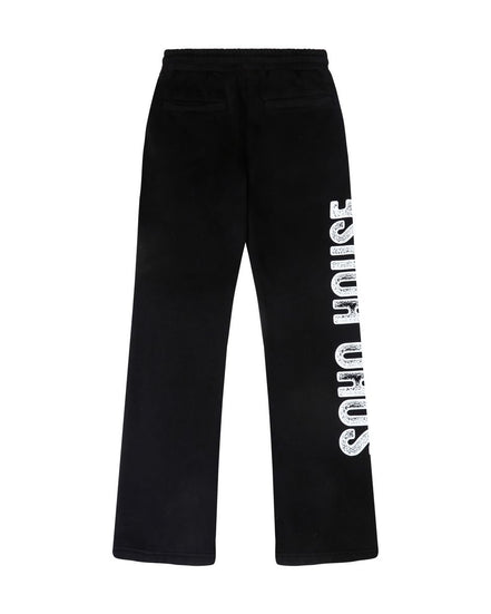Black wide-leg sweatpants with a vertical white 'SOHO HOUSE' logo printed down the left leg, shown against a plain white background.