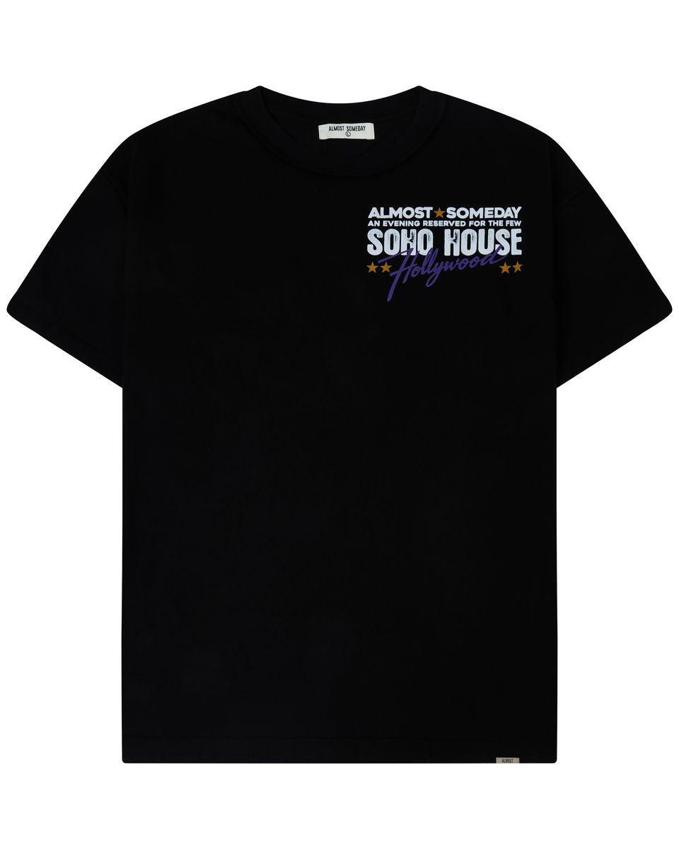 A dark navy blue short-sleeve athletic t-shirt with green trim along the collar, featuring the white 'ALMOST SOMEDAY' brand logo on the right chest and a red and white rugby crest on the left chest.