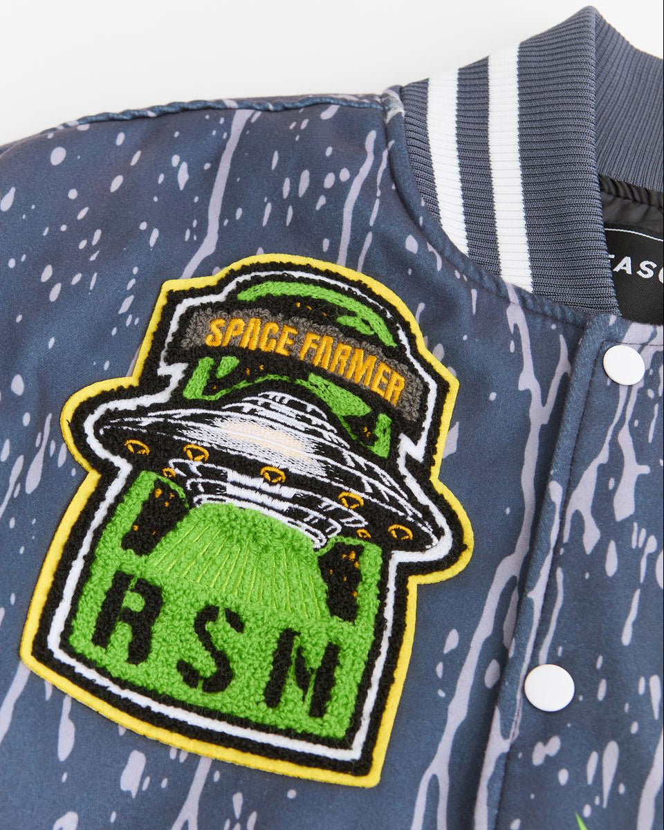 Varsity jacket with 'Space Farmer RSM' patch on a white background