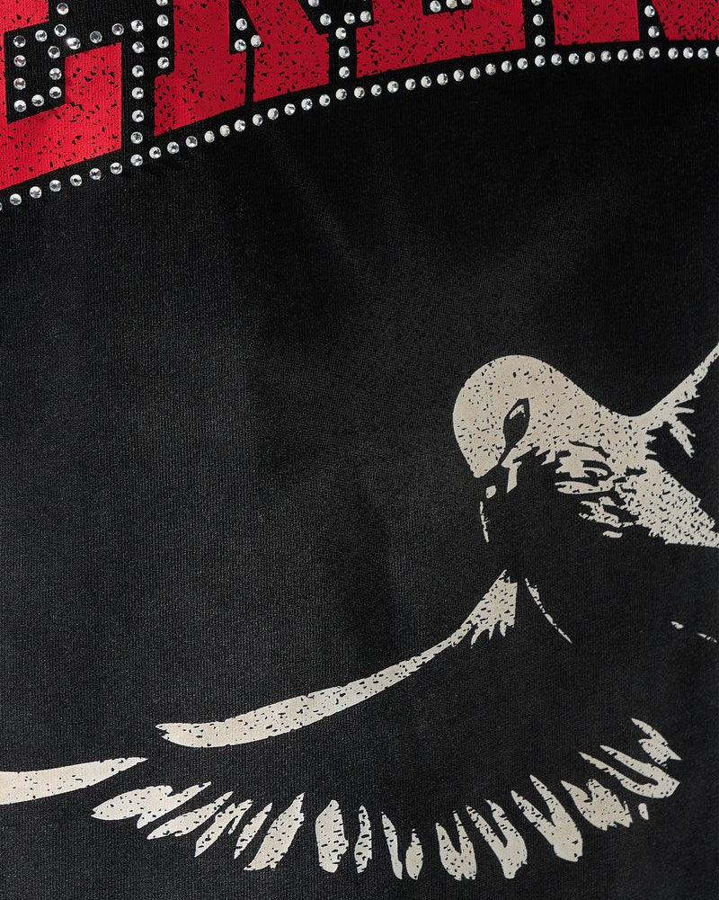 Black t-shirt with a white bird graphic and red and white text at the top.