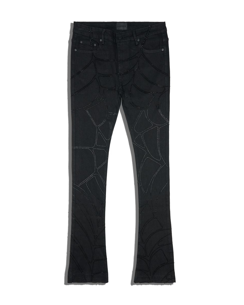 Black jeans with spider web pattern made out of rhinestones on a white background