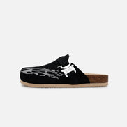 Black slipper with white design on a white background
