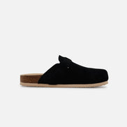 Black slipper with cork insole on a white background