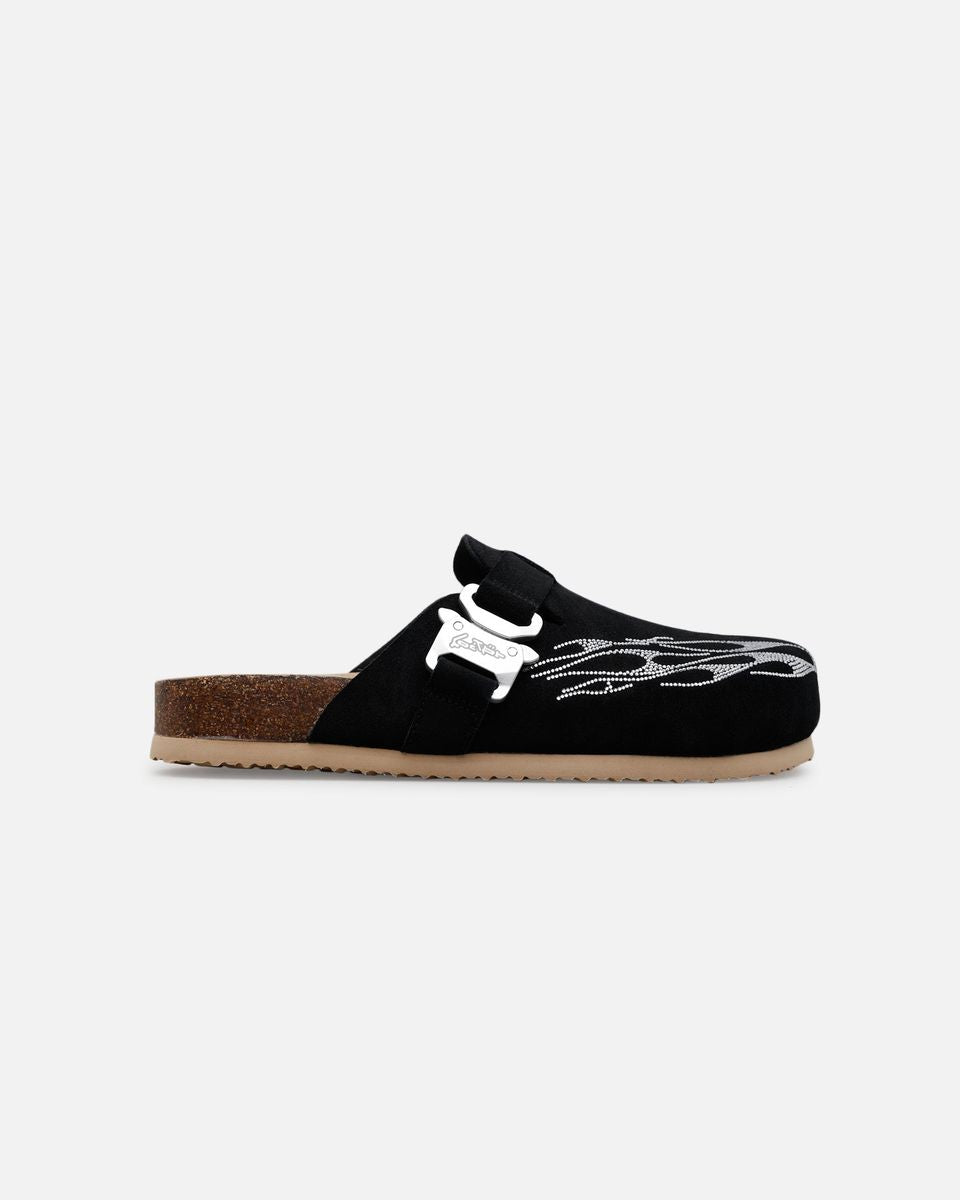 Black sandal with white design on a white background