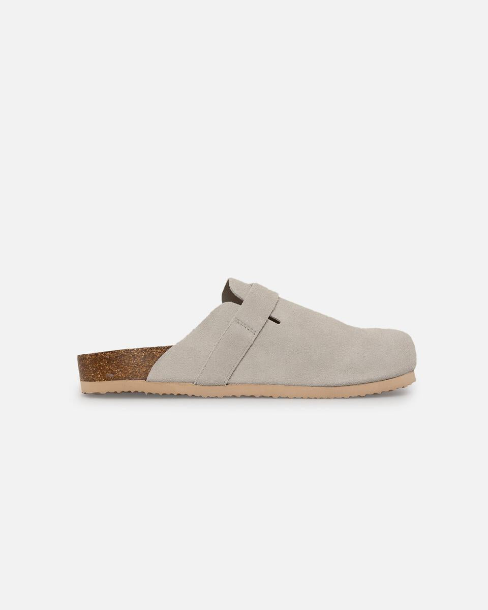 Beige clog shoe on a white background