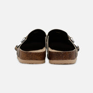 Pair of brown sandals with cork sole on a white background