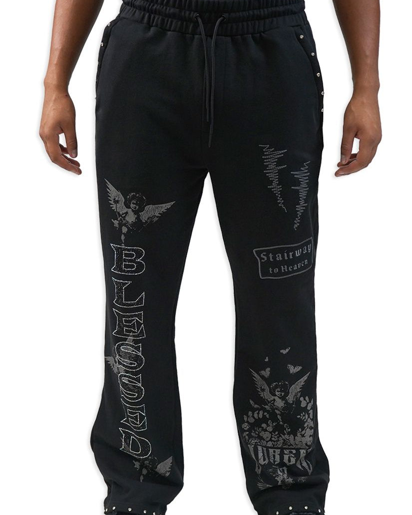 Black sweatpants with graphic designs and text on a white background