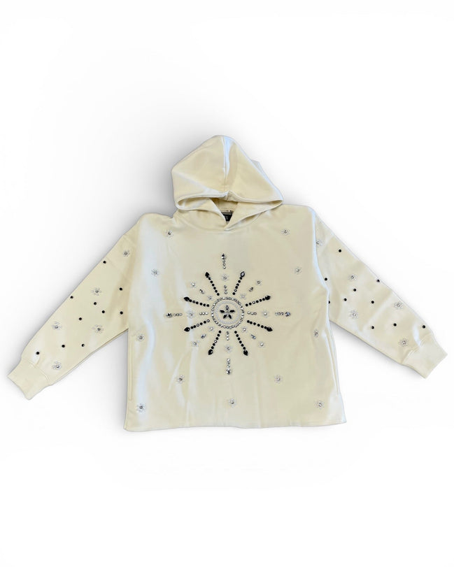 Beige hoodie with star design on a white background