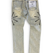 Light-colored jeans with decorative elements on a white background
