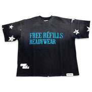 A black short-sleeve t-shirt with 'FREE REFILLS READYWEAR' printed in bright blue across the chest, decorated with white star graphics on the sleeves and hem, and a small white brand tag near the bottom right.