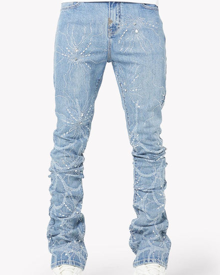 Light blue distressed jeans on a white background