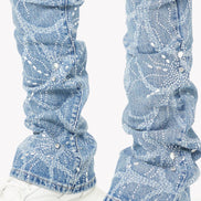Blue denim leg warmers worn over white sneakers on a white background