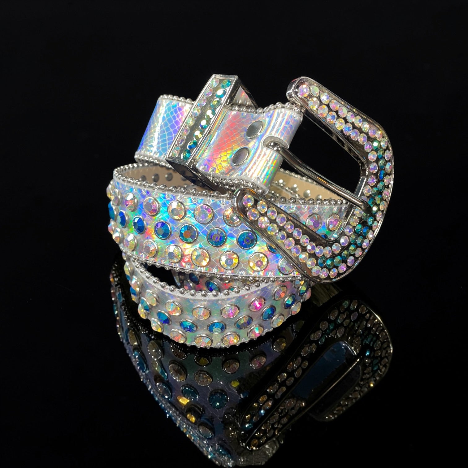 Sparkling belt with a large, ornate buckle on a black background