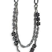 A silver-toned double-layer chain strap with black rhinestone-embellished oval links, displayed on a clean white background.