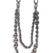 A silver-toned chain accessory with textured links and multiple cylindrical beads set with clear stones and red inlay, displayed on a white background.
