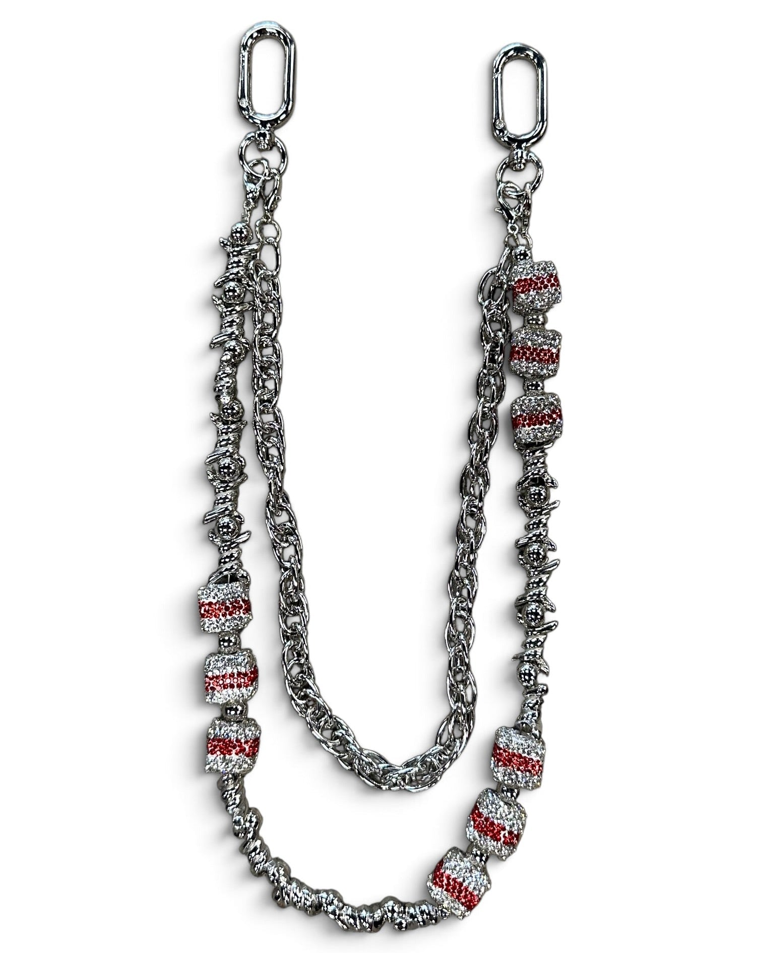A silver-toned chain accessory with textured links and multiple cylindrical beads set with clear stones and red inlay, displayed on a white background.