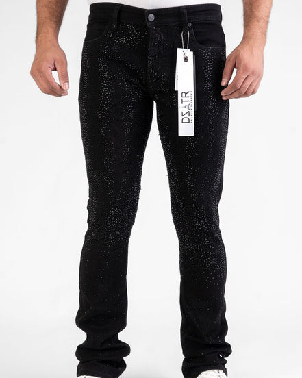 Black jeans with a visible brand tag on a white background