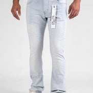 Light blue jeans worn by a person on a white background