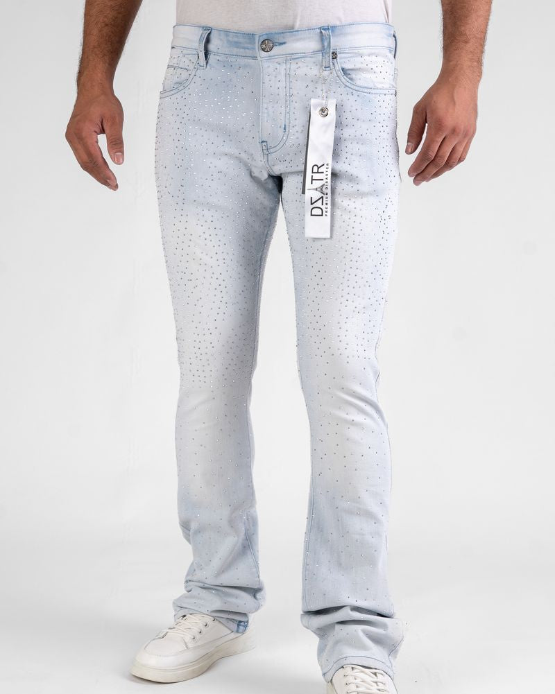 Light blue jeans worn by a person on a white background
