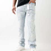 Person wearing light blue jeans with a visible brand label on a white background