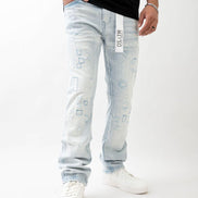 Person wearing light blue jeans with a brand logo on a white background