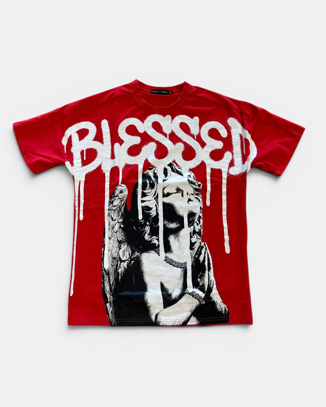 Red t-shirt with 'BLESSED' text and graphic design on a white background