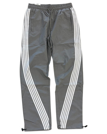Gray track pants with white diagonal stripes running down the sides, featuring an elastic waistband and drawstring.