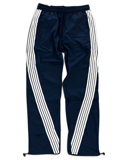 Navy blue track pants with three white stripes running down the sides, featuring an elastic waistband and drawstring.