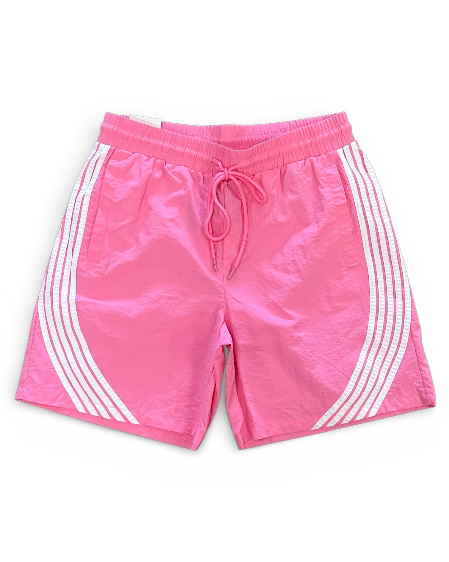 Pink shorts with white stripes on a white background