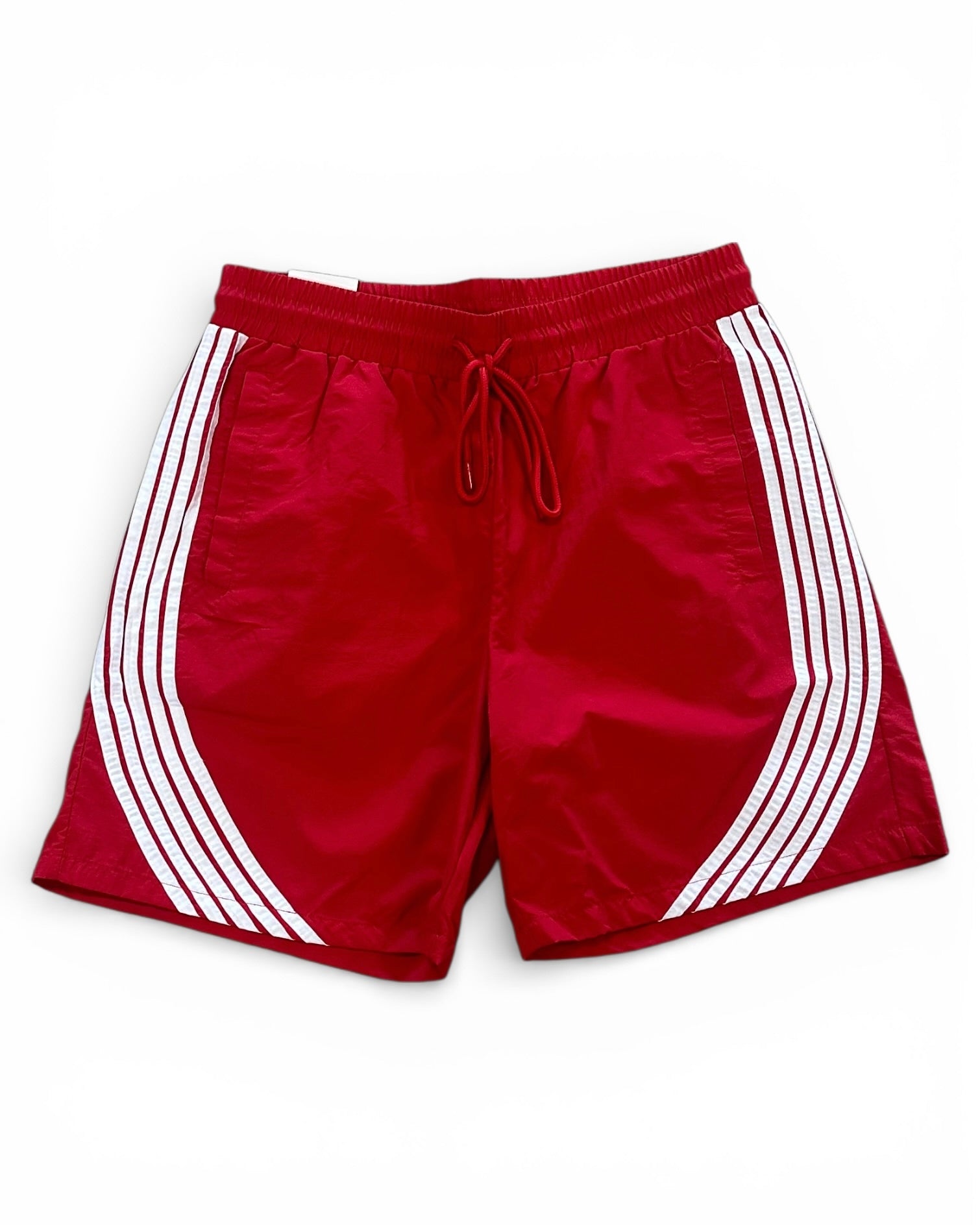Red shorts with white stripes on a white background