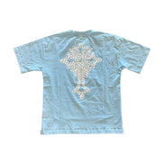 Light blue t-shirt with a decorative white pattern on the back against a white background