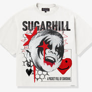 A white short-sleeve graphic T-shirt featuring a stylized black-and-white clown face with red star and heart accents, plus the text 'SUGARHILL' and 'A POCKET FULL OF SUNSHINE' on a clean white background.