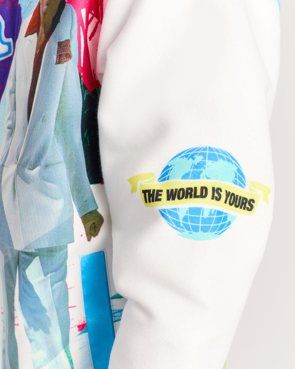 Sweatshirt with a graphic design of a globe and 'The World is Yours' text on a white background.