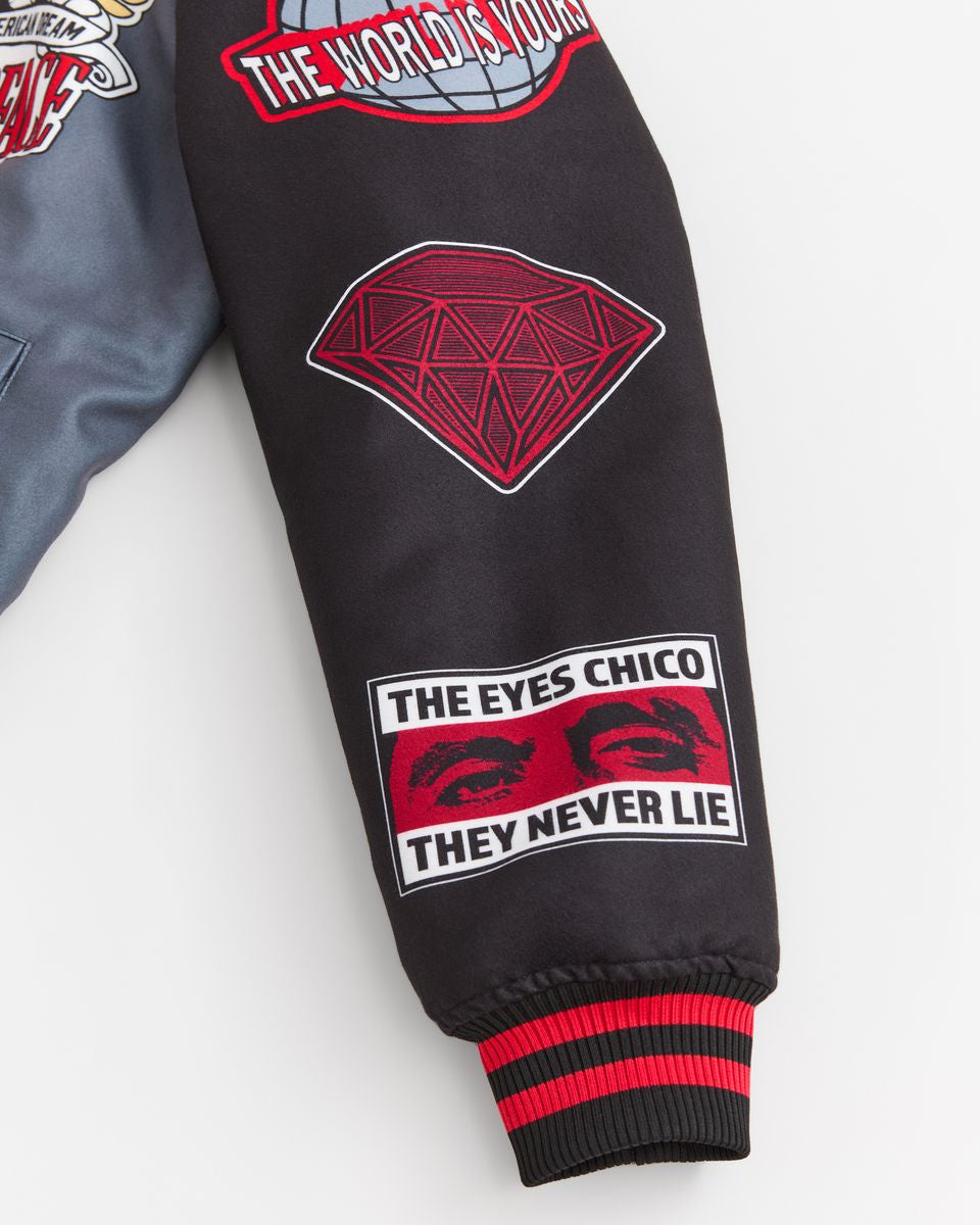 Black jacket sleeve with red and white text and graphics on a light gray background
