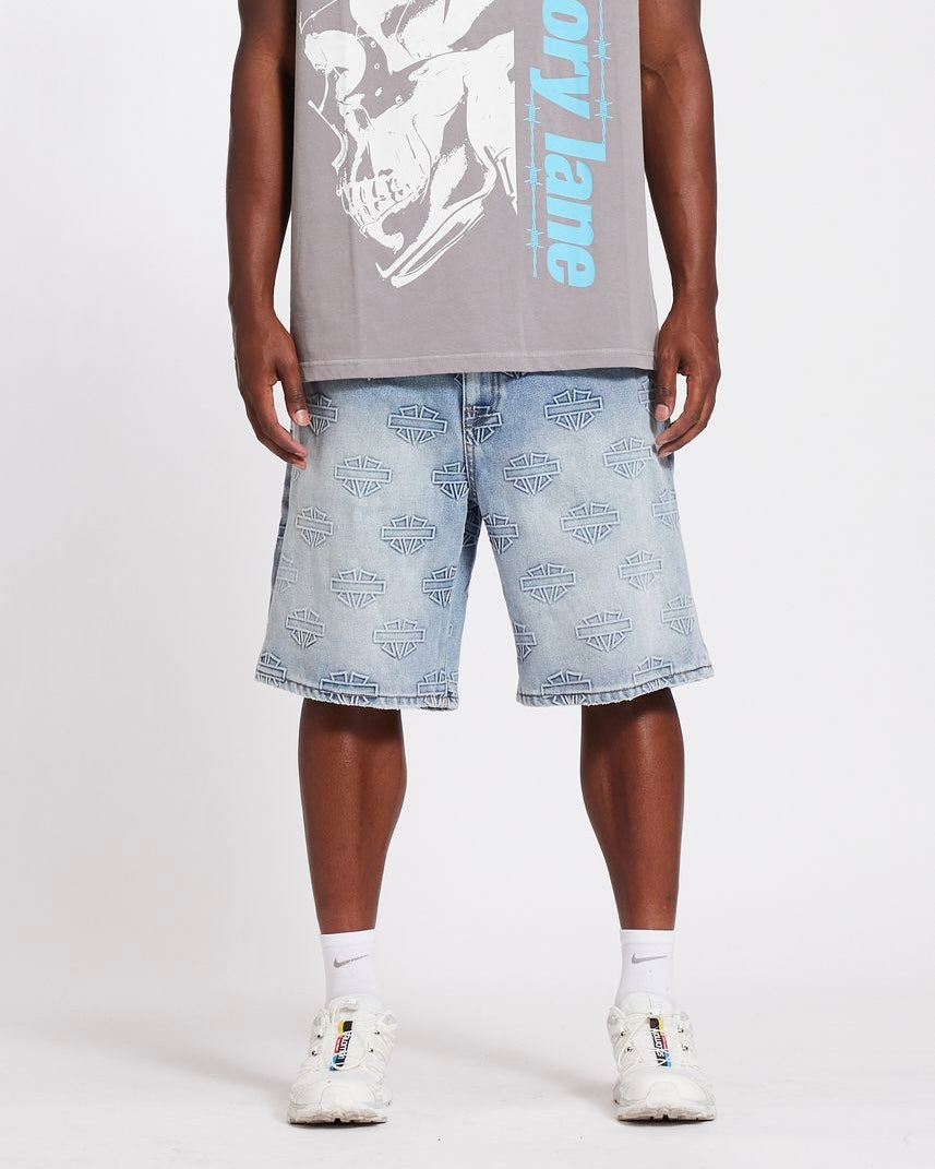 Memory lane M Shield Debossed Pattern Shorts in light blue 