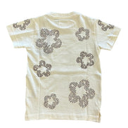 Beige t-shirt with brown floral patterns on a white background