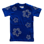 Blue t-shirt with silver floral patterns on a white background
