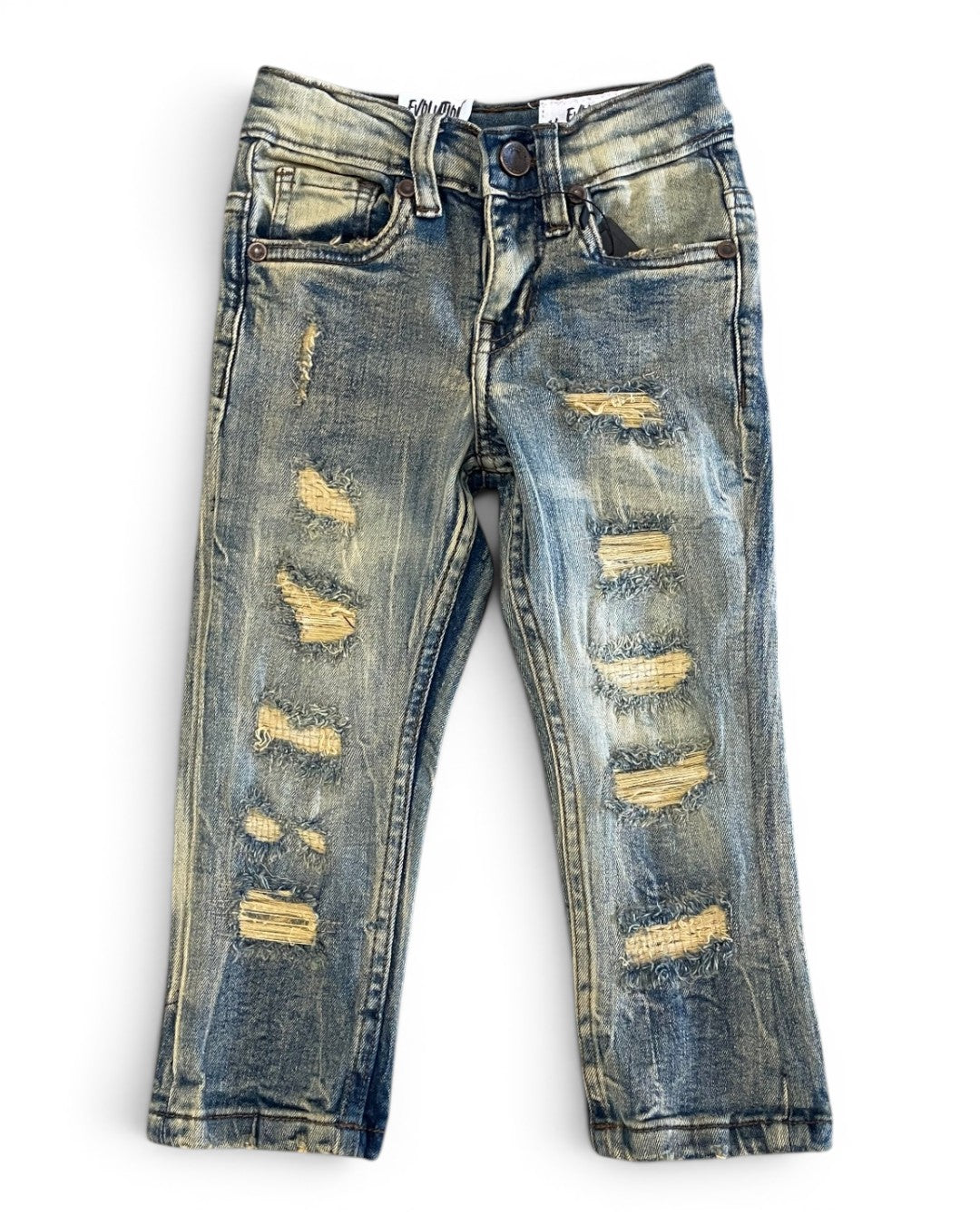 Distressed blue jeans on a white background