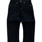 A pair of BLACK denim jeans with distressed details and vertical text patterns, shown flat against a white background.