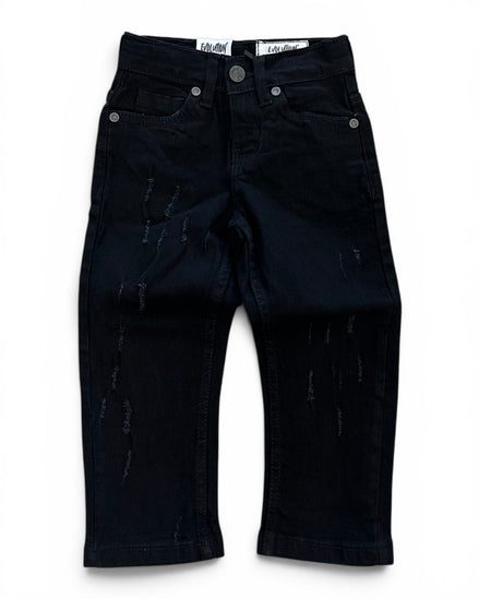 A pair of BLACK denim jeans with distressed details and vertical text patterns, shown flat against a white background.