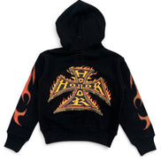 A black hooded sweatshirt shown from the back, featuring a large metallic gold and orange flame-cross graphic with the word 'HONOR' across the center, and matching flame motifs printed down both sleeves.