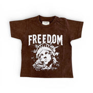 Brown t-shirt with 'FREEDOM' graphic design on a white background