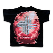 A black short-sleeve graphic T-shirt featuring a large front print with a metallic silver cross over a red and pink smoky circular design, with the word 'SAINTS' below.